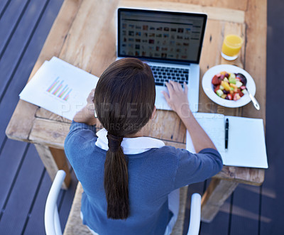Buy stock photo Worker, laptop and table with breakfast, outdoor and food as healthy meal, working and online. Above person, employee and writing with technology and back of creative with juice in remote workplace