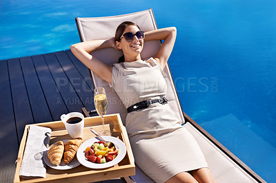 Buy stock photo Swimming pool, relax and business woman with breakfast, holiday and summer with weekend break or nutrition. Person, sunshine or girl on getaway trip or healthy meal with luxury, vacation or happiness