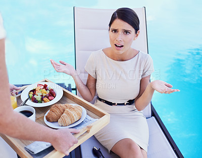 Buy stock photo Woman, customer and angry with food service, frustrated and poor quality with complain and review. Client, swimming pool and lady upset with meal or hospitality industry with wrong order or feedback