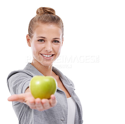 Buy stock photo A young woman holding an apple isolated on white