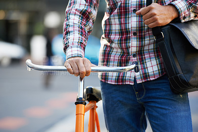 Buy stock photo Hands, person and push bike in street to travel on eco friendly transport outdoor, commute or walking on trip. Cycling, bag and bicycle in urban town, city or road for journey or closeup in summer