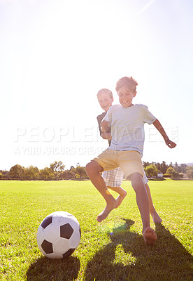 Buy stock photo Soccer, friends and playing for fun on grass, support and smiling for sports game on field. Happy boys, children and performance on outdoor pitch, bonding and laughing for competition or challenge