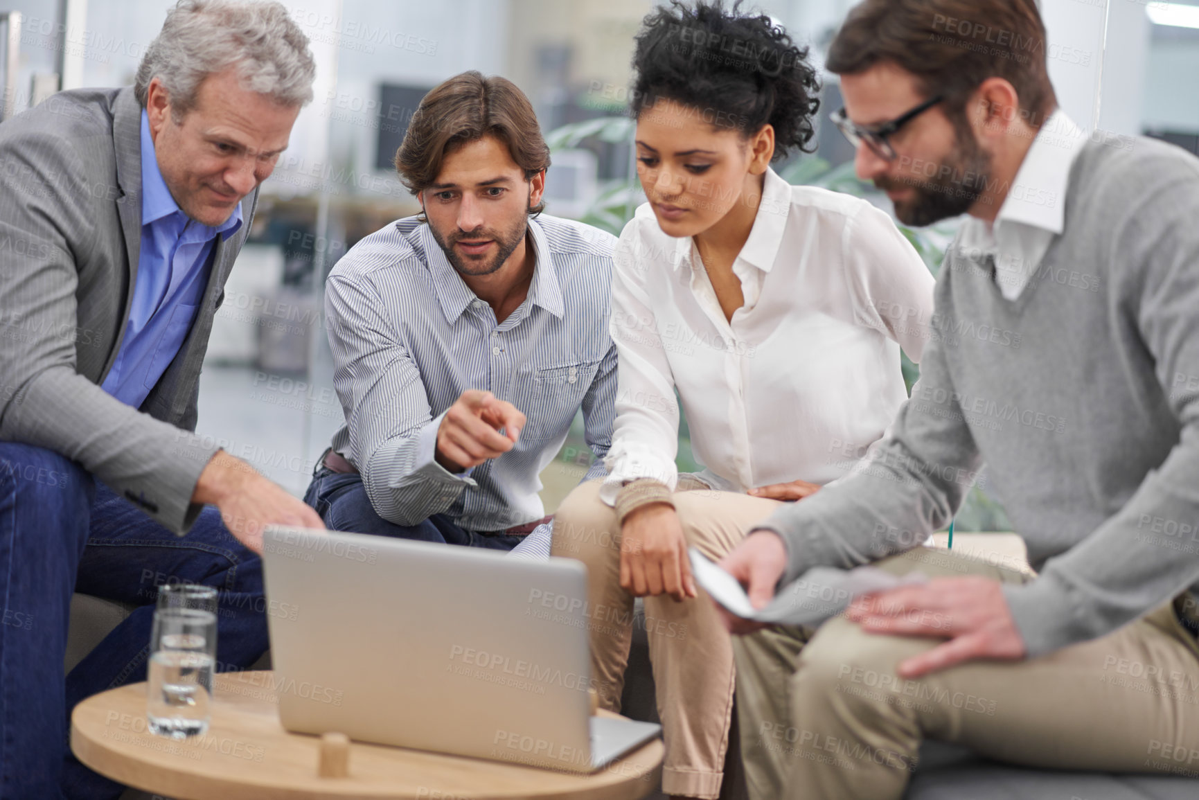 Buy stock photo Business people, laptop and teamwork in meeting for planning, strategy or brainstorming at office. Group of employees on computer for discussion, project plan or research and development at workplace