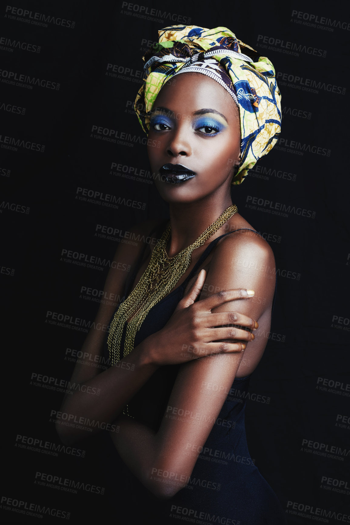 Buy stock photo A beautiful african woman posing against a black background