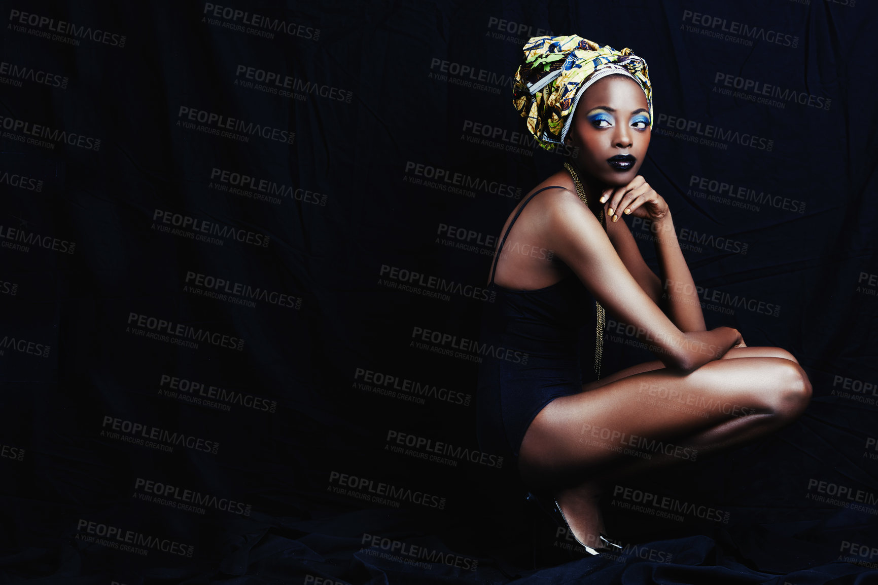 Buy stock photo Black woman, turban and thinking with fashion, head scarf and mockup in studio. Cosmetics, trendy and style with African female person from Kenya with traditional silk wrap with dark background