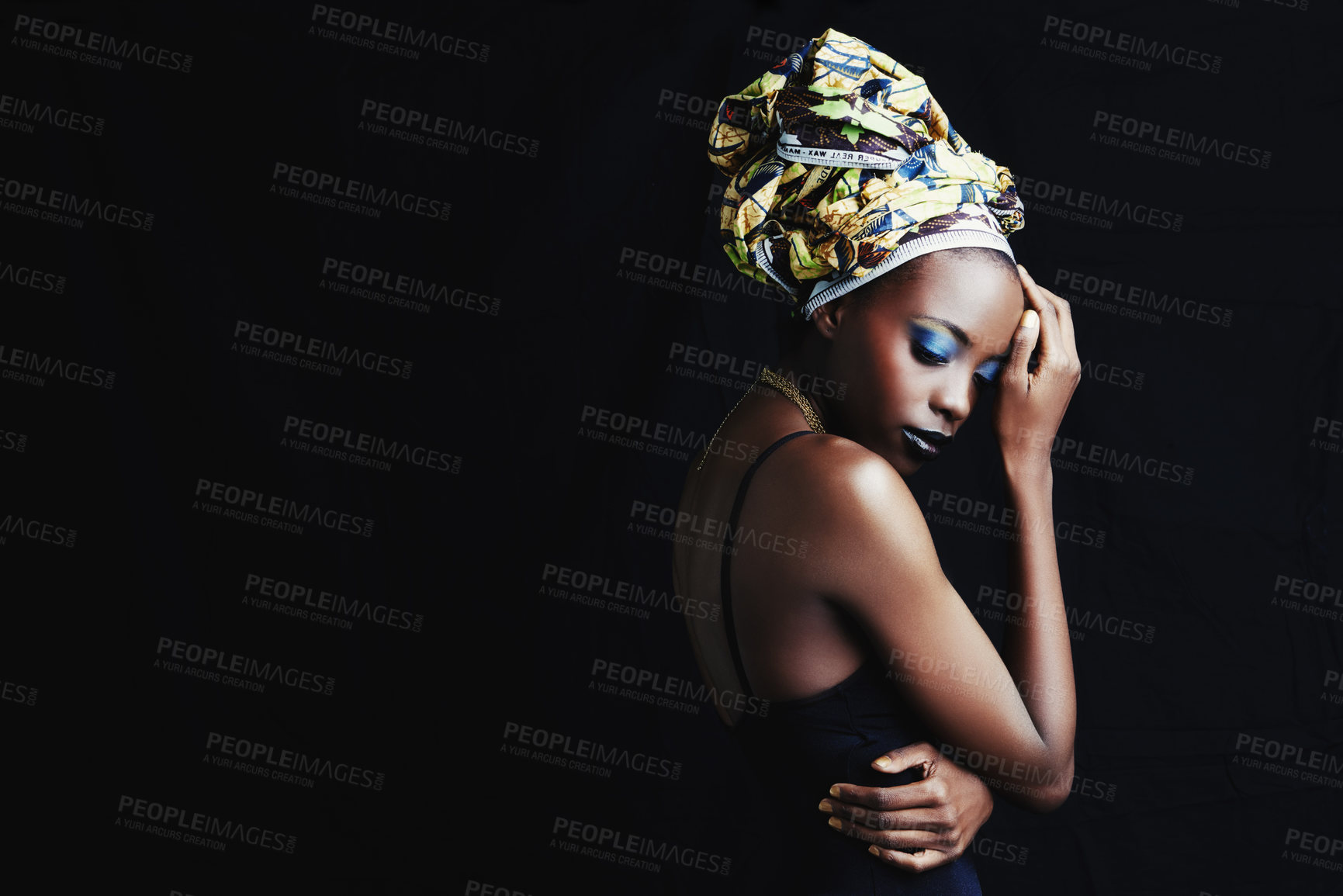 Buy stock photo A beautiufl young african woman posing in the studio isolated on white
