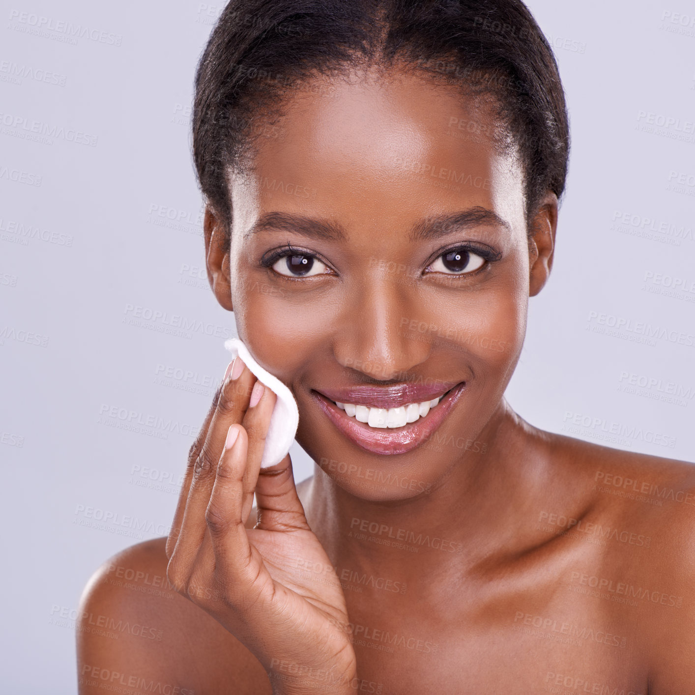 Buy stock photo Black woman, makeup and cotton pad, beauty and clean face for hygiene, removal and skincare on white background. Cosmetic product, wipe skin for treatment and portrait in studio, facial and self care