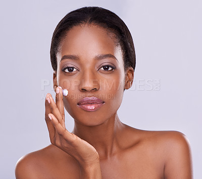 Buy stock photo Portrait, cream and black woman for beauty and dermatology, cosmetic product and shine on white background. Skincare, lotion or sunscreen for moisturizer, antiaging with skin and facial in studio