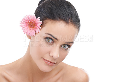 Buy stock photo Woman, portrait and flower with natural beauty for skincare or cosmetics on a white studio background. Face of female person, brunette or model with smile in satisfaction for healthy skin on mockup