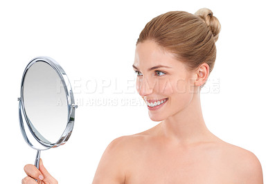 Buy stock photo Cropped shot of a beautiful young woman holding a mirror