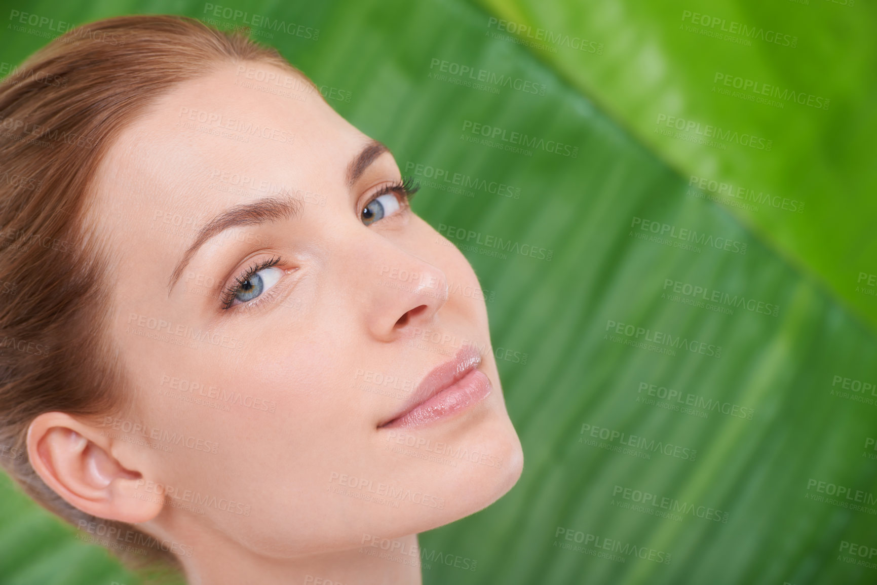 Buy stock photo Woman, skincare and portrait with leaves, health and sustainability for organic cosmetics. Girl, person or model with palm tree for wellness, touch or glow with dermatology for facial skin by plants