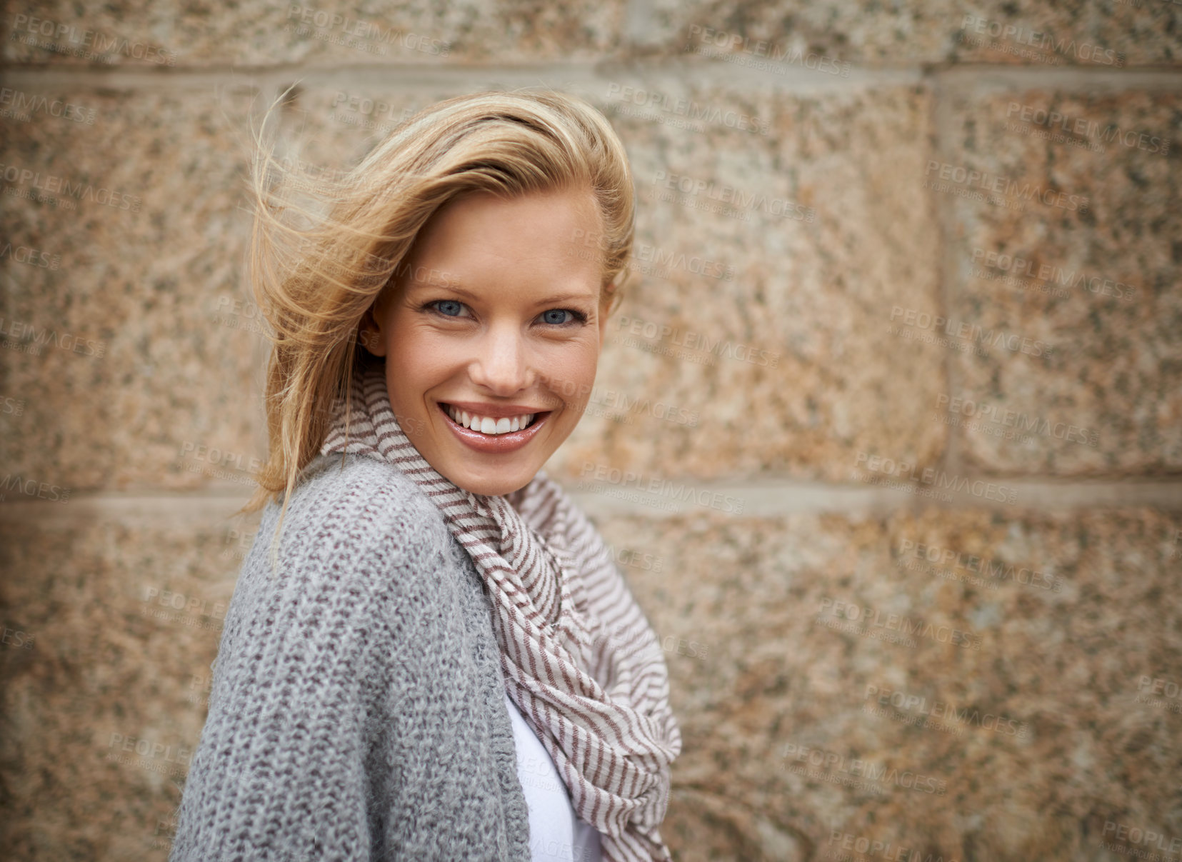 Buy stock photo Cropped portrait of a pretty young blonde in warm winter fashion