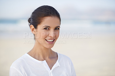 Buy stock photo Woman, portrait and happy at beach with travel, mockup space and positivity outdoor. Holiday in summer, nature and wellness with adventure in Bali, calm and peace by the ocean with fresh air