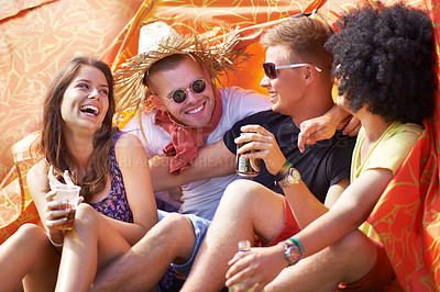 Buy stock photo Happy friends, laughing and camping in tent for funny joke, comedy or humor at outdoor festival. Friendship, young group or people smile enjoying fun holiday, drinks or event for bonding on campsite