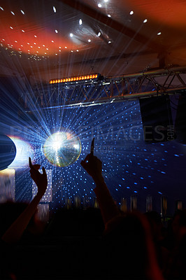 Buy stock photo Disco ball at a party, people and crowd with rave, music festival and lights with celebration and excitement. Audience, men and women with concert and cheerful with New Years event and entertainment