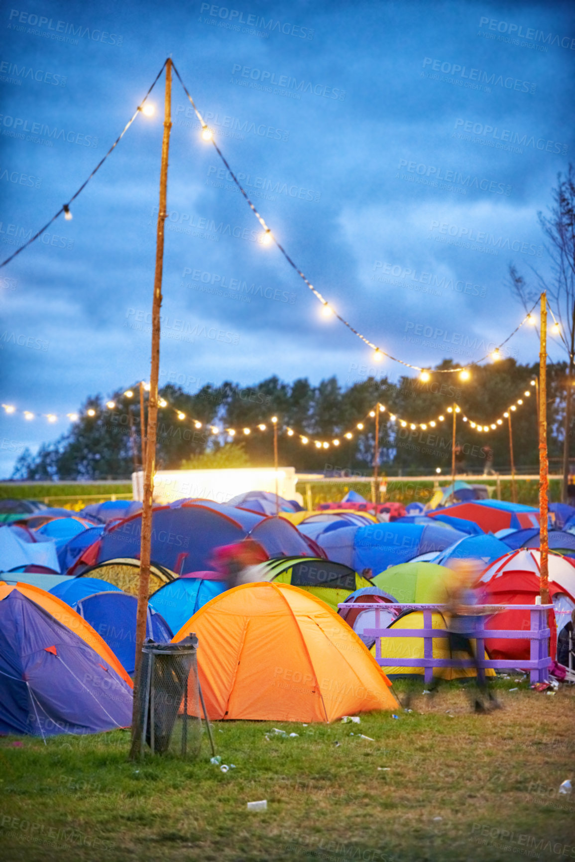 Buy stock photo Shot of a large group of tents at an outdoor festival