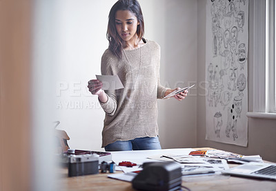 Buy stock photo Woman, visual artist and office with picture for portfolio,  inspiration and project for magazine. Design, create and strategy on visual with photography for storyboard and brand identity for client