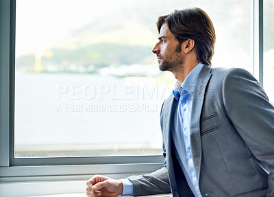 Buy stock photo Business man, thinking and planning by window in office, wondering and contemplating real estate opportunity. Male person, view and ideas for future at company, employee and vision for development