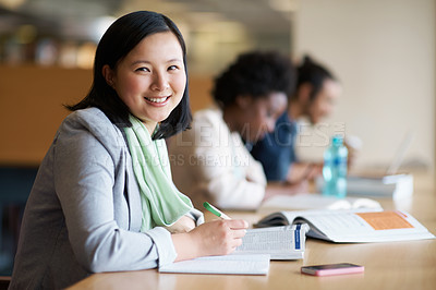 Buy stock photo Student, portrait and library studying with book at desk for university or education for future, exam or scholarship. Asian person, writing and college degree in Korea for academic, campus or test