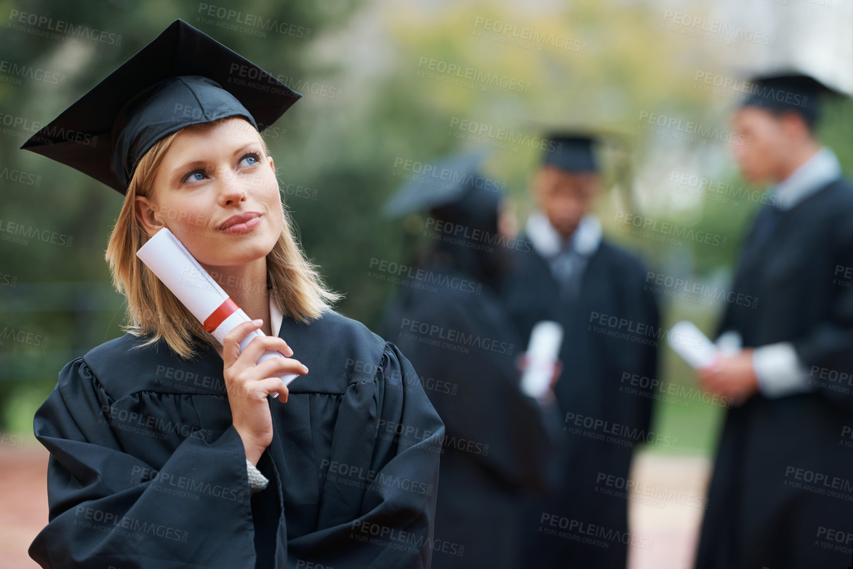 Buy stock photo Graduation, certificate and thinking with student woman outdoor on campus for university or college event. Future, planning and vision with young graduate at school for education or scholarship