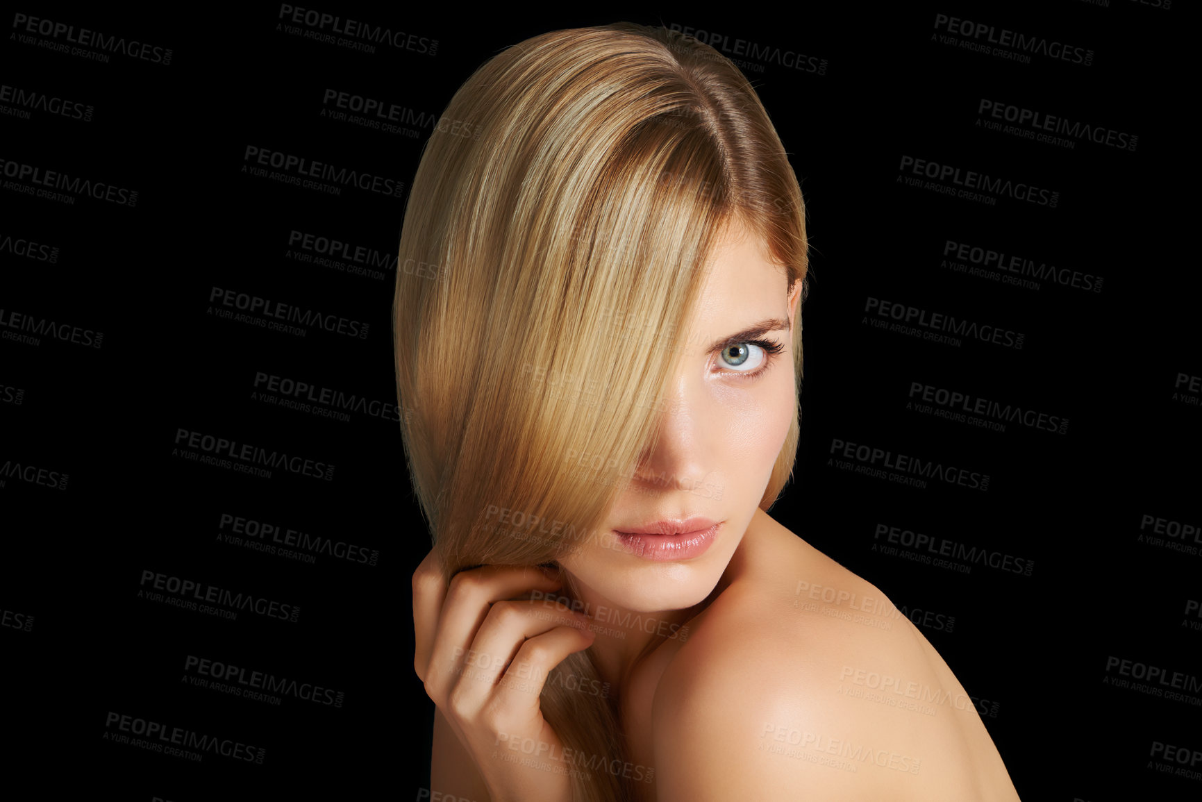 Buy stock photo Portrait of a beautiful blonde woman isolated on black