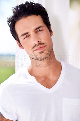 Buy stock photo Shot of ruggedly handsome young man