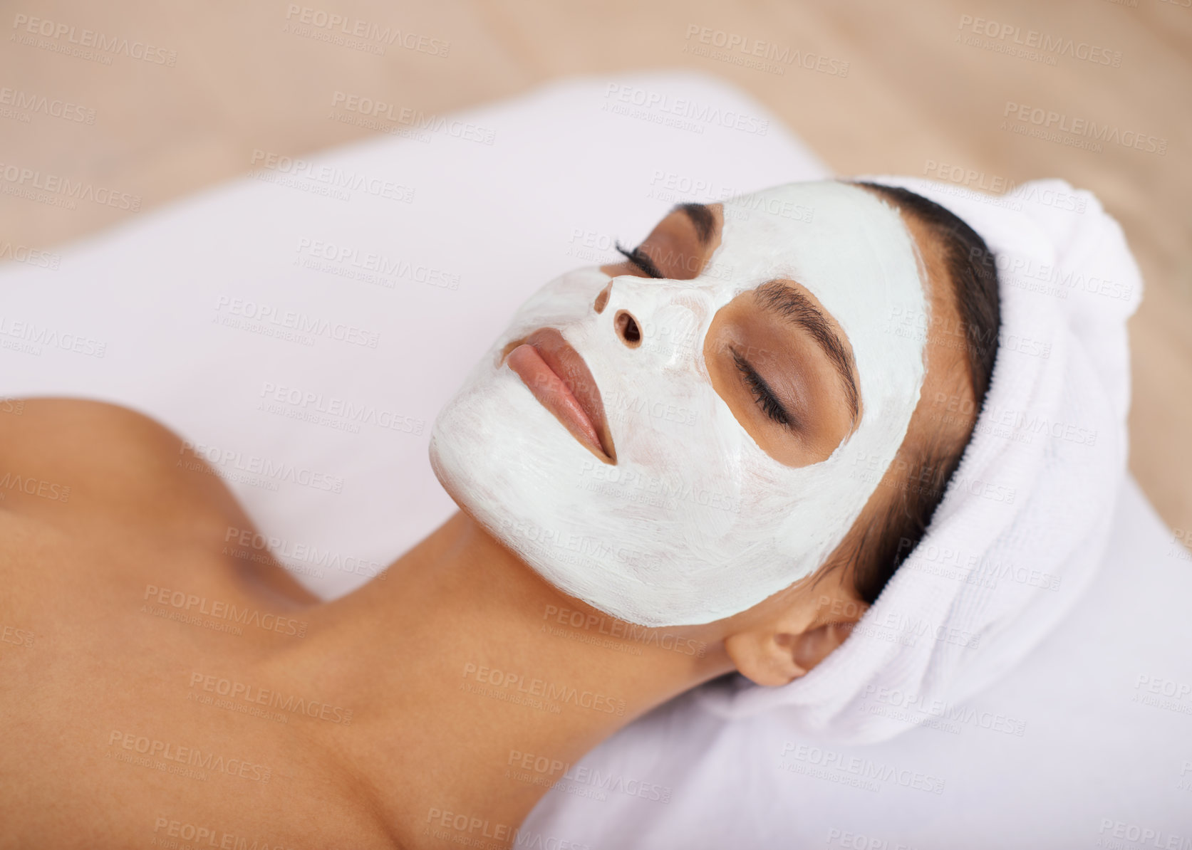 Buy stock photo Woman, clay mask and facial for skincare in spa, detox and cosmetic treatment for beauty or health. Person, relax or dermatology with natural cleaning on skin, soothing or zen with wellness in salon