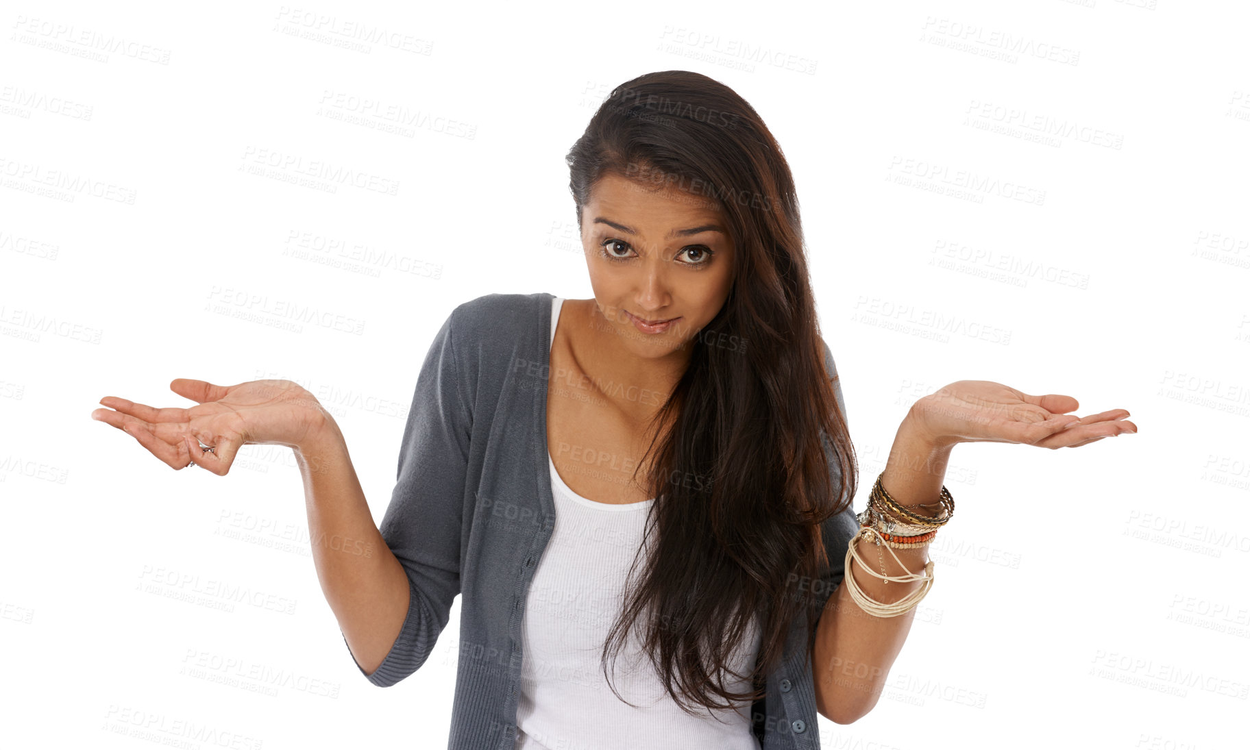 Buy stock photo A young woman looking indecisive while smiling at the camera