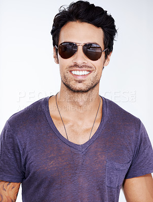 Buy stock photo Happy, portrait and man with fashion in sunglasses on studio, white background with confidence. Summer, holiday and person smile in casual outfit for vacation and relax in cool style with pride