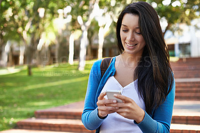 Buy stock photo College, woman and typing outdoor with phone for social media and walking with communication on campus. Online, chat and girl with virtual contact on smartphone, connection and networking in Paris