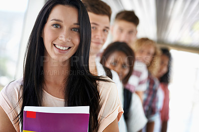 Buy stock photo Girl, portrait and smile at university for studying, education and campus for commitment. Female student, school and row for scholarship at academy, learning and college line for knowledge and future