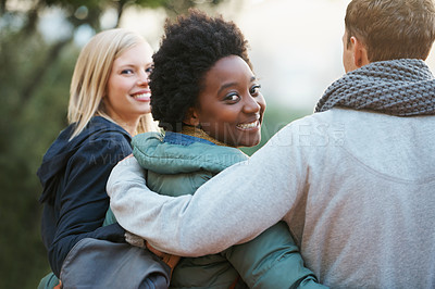 Buy stock photo College, friends and happy with hug outdoor for bonding, relax and break on campus with diversity. University, people and smile with embrace for support, education and learning fun with scholarship