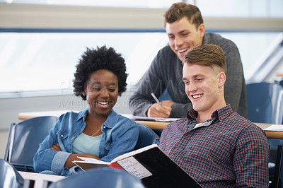 Buy stock photo Student, studying and friends in a classroom with learning, education and university with smile. Book, college and test with notebook, lecture and group with diversity and young people at school