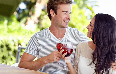 Buy stock photo Couple, wine glasses and toast for marriage anniversary, romance and alcohol for celebration in outdoors. Happy people, together and cheers for milestone in relationship, gratitude and support