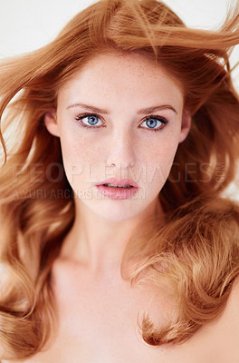 Buy stock photo Portrait, beauty and hair with a ginger woman in studio on a white background for natural cosmetics or skincare. Face, makeup and haircare with a young female model at the salon for shampoo treatment