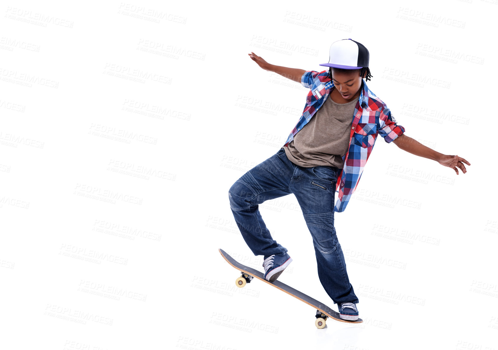 Buy stock photo Skateboard, black boy and kid in a studio with mockup and jump trick with young style. Isolated, white background and African male child with a skateboarding and skater with energy and skill