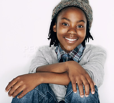 Buy stock photo Boy, fashion and portrait with gen z, trendy and cool style with a smile in a studio. Child, happy and African male kid from Chicago with confidence and modern youth outfit with white background
