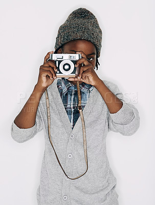 Buy stock photo Photographer, portrait or child in studio with camera isolated on white background for creative talent. Photography, African boy or cool kid artist with hobby, style or picture ready for photoshoot