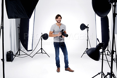 Buy stock photo A professional photographer in his studio