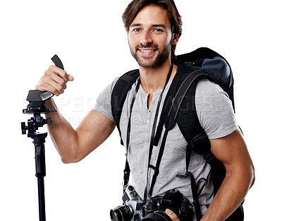 Buy stock photo Portrait, man and backpack with photography equipment for photoshoot in studio on white background. Professional photographer, confidence and bag with cameras, tripod and big smile for mockup