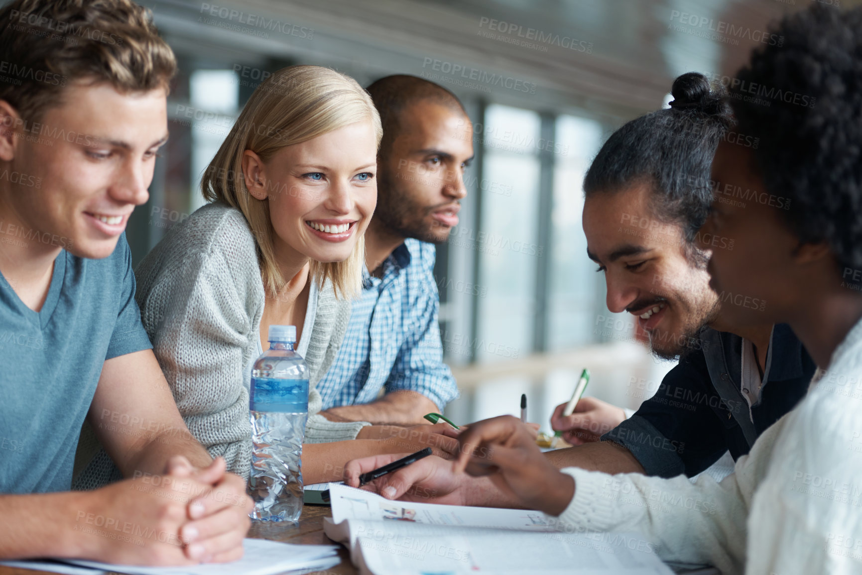 Buy stock photo Education, people at university and students studying together, share ideas and research for project in library. Happy, academic discussion for assignment on campus and diversity with scholarship