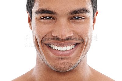 Buy stock photo Portrait of a handsome young man giving you a toothy smile