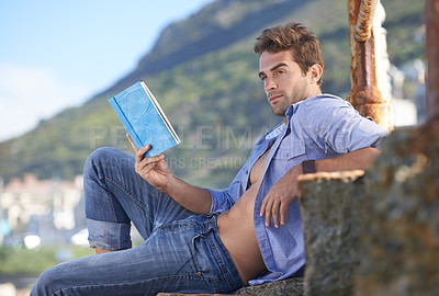 Buy stock photo Thinking, outdoor and man with a book, relax and vacation with weekend break and hobby. Person, travel and decision with guy reading a book ot holiday with activity and learning with a story or peace