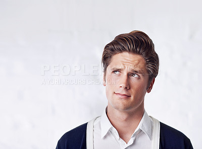 Buy stock photo Thinking, confused and man with why, questions or brainstorming, asking or opinion choice on wall background. Doubt, consider and male person with problem solving, memory or guess emoji for solution