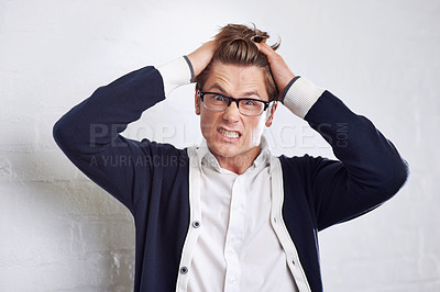 Buy stock photo Business, stress and portrait of man with hands in hair for crisis, disaster or panic on wall background. Angry, face and overthinking male entrepreneur with startup risk, fail or bankruptcy anxiety