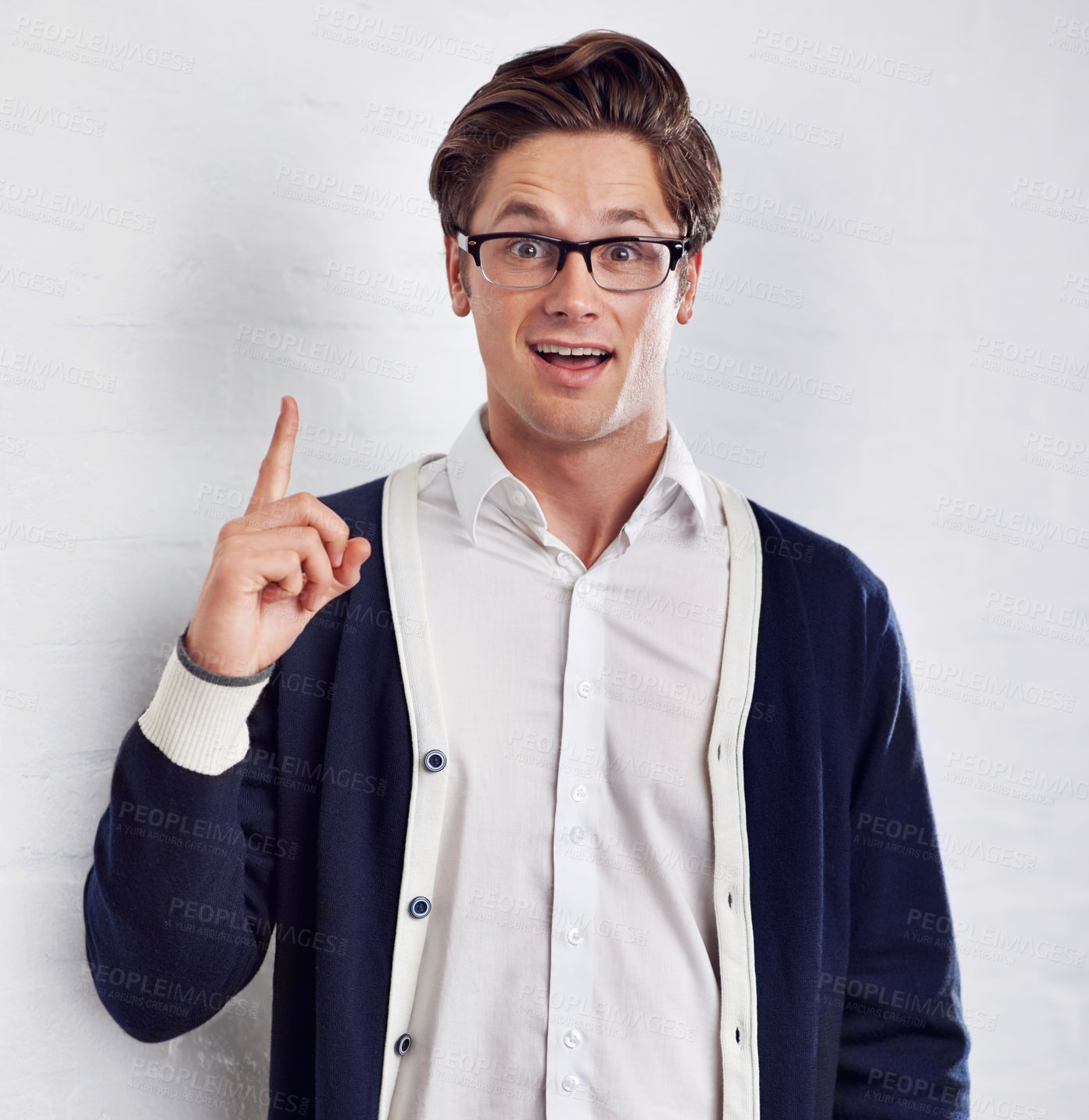 Buy stock photo Happy man, portrait and idea for solution, decision or choice with glasses on a white studio background. Face of young male person pointing up in surprise for problem solving or plan on mockup space
