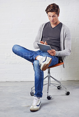 Buy stock photo Man, chair and tablet with surprise for online technology on wall background for communication, streaming or internet. Male person, wow and digital search for connectivity, gaming or social media