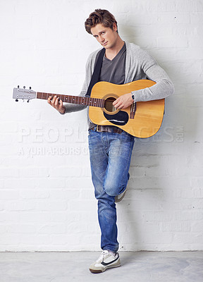 Buy stock photo Man in portrait, guitar and musician with creativity and music, acoustic for entertainment and performance on wall background. Busker, artist and musical instrument for art, track or song with talent