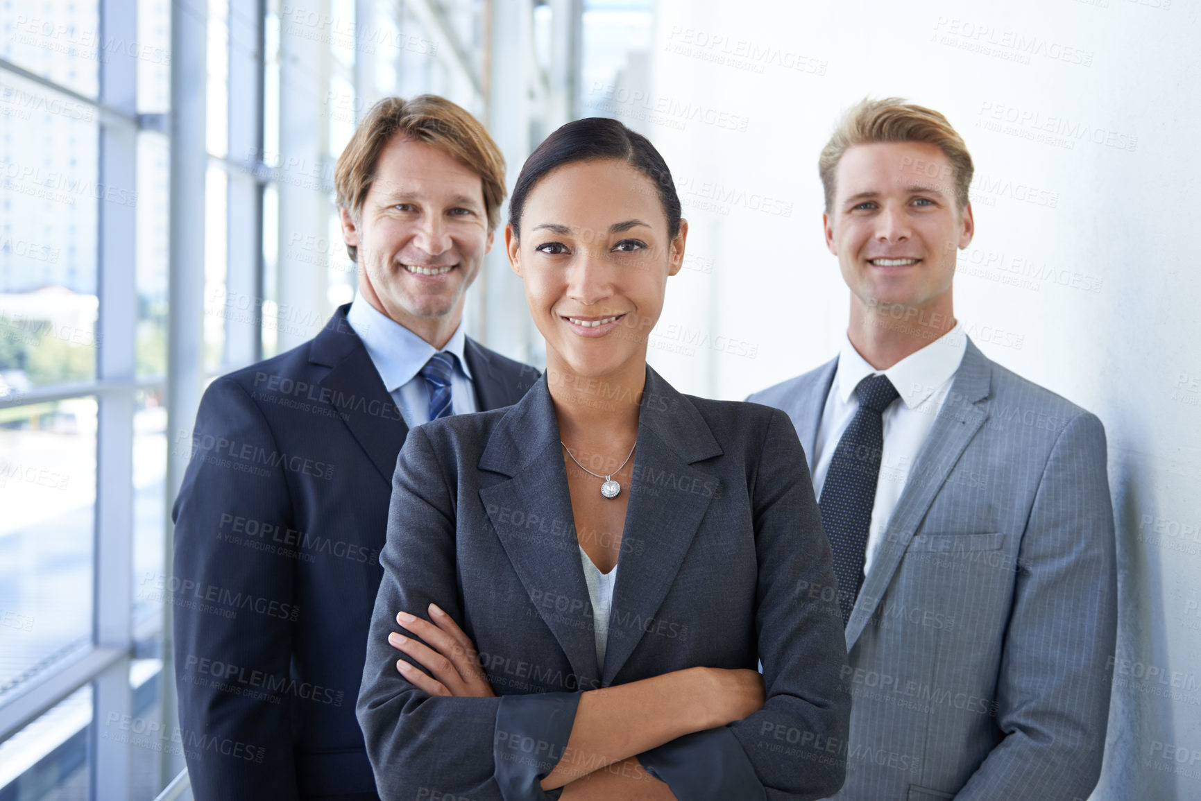 Buy stock photo Teamwork, crossed arms and portrait of business people for pride, confidence and collaboration in hallway. Corporate lawyers, professional and men and woman for partnership, leadership and about us