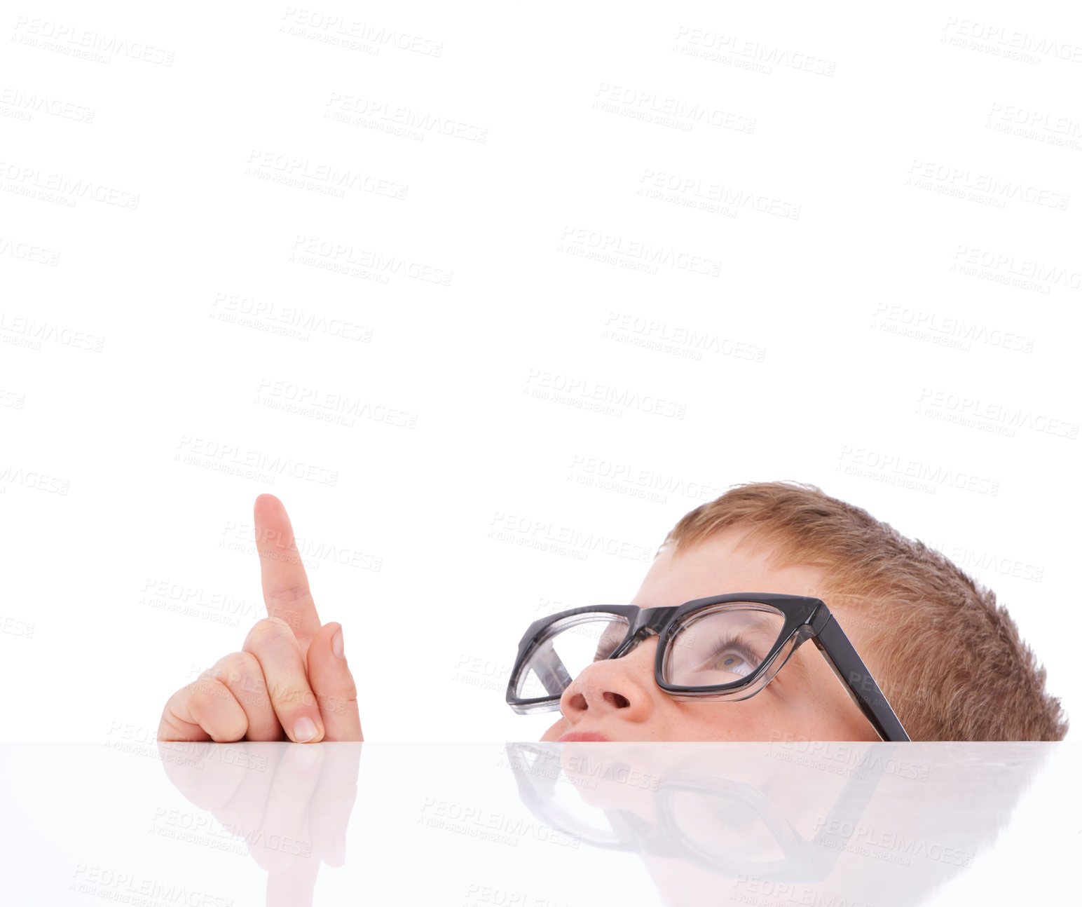 Buy stock photo Mock up, studio face or child point at sales promotion, present gift or discount deal mockup. Table desk, advertising space or marketing product placement with kid model isolated on white background